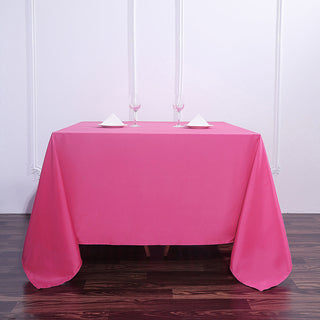 Add a Festive Touch to Your Event with the Fuchsia Square Polyester Tablecloth