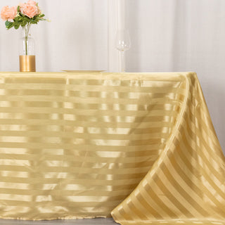 Elevate Your Event with the 90"x132" Champagne Satin Stripe Seamless Rectangular Tablecloth