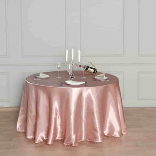 Elevate Your Event Décor with the 108" Dusty Rose Seamless Satin Round Tablecloth