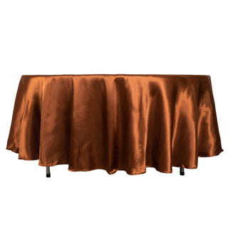 Enhance Your Event Decor with a Seamless Cinnamon Brown Satin Round Tablecloth