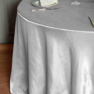 Create a Stunning Table Setting with the Silver Seamless Satin Round Tablecloth