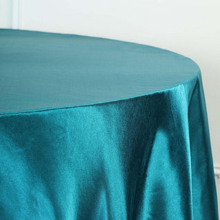 Enhance Your Event Decor with the Teal Seamless Satin Round Tablecloth