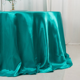 <h3 style="margin-left:0px;"><strong>Seamless Turquoise Satin Round Tablecloth: The Key to a Perfect Table Setting</strong>