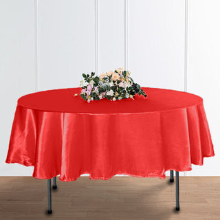 Add Elegance to Your Event with the 90" Red Seamless Satin Round Tablecloth