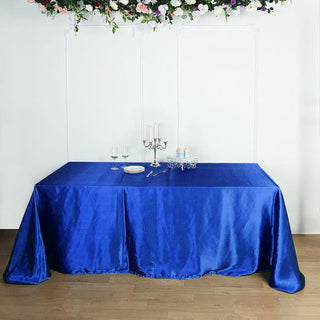 Elevate Your Event with the Royal Blue Seamless Satin Rectangular Tablecloth