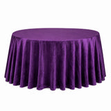 Purple round tablecloth with velvet drape on round table