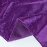 Purple velvet fabric texture with stitched seam detail close-up