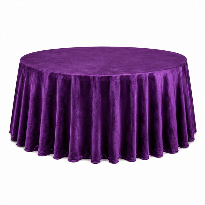 Purple velvet round tablecloth draped over a banquet table