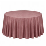 Round mauve velvet tablecloth on banquet table