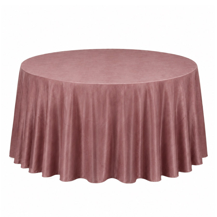 Round mauve velvet tablecloth on banquet table