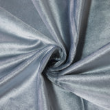 Shiny silver satin fabric close-up with elegant swirl folds#whtbkgd