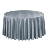 Round table with silver gray satin tablecloth and floor-length drape