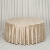 Champagne round velvet tablecloth on elegant draped backdrop