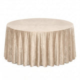 Round beige velvet tablecloth with floor-length drape on banquet table