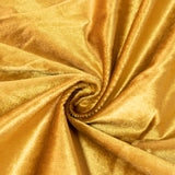 Golden satin fabric swirls with a glossy, luxurious texture#whtbkgd