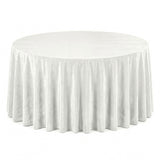 White round table with elegant floor-length tablecloth