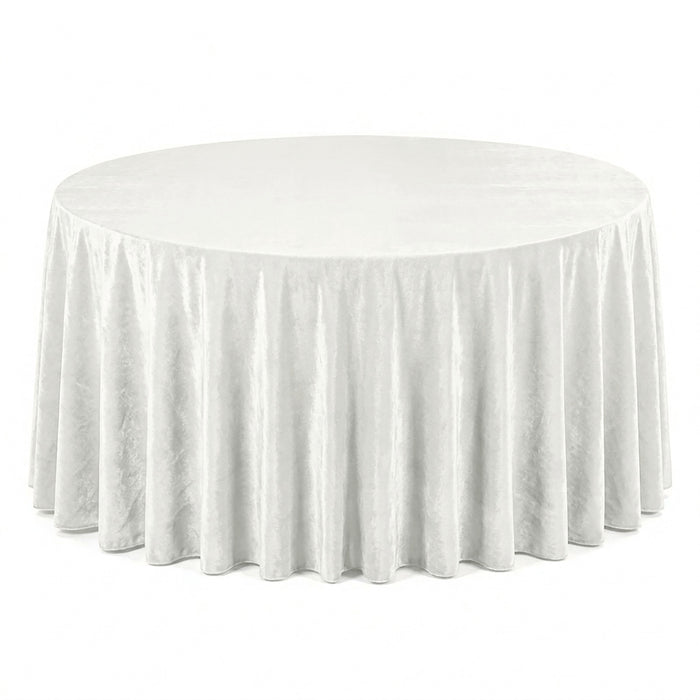 White round table with elegant floor-length tablecloth