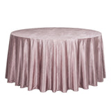 Round blush pink velvet tablecloth on banquet table
