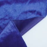 Blue velvet fabric close-up with stitched seam and textured textile layers
