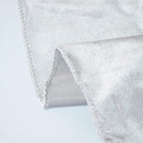 Soft white fleece fabric close-up with stitched edge and mesh lining