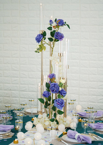Tall floral centerpiece on teal tablescape