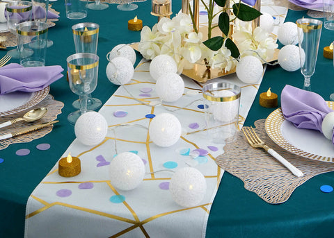 White runner with geometric gold pattern and lights