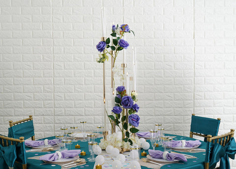 Wide view of teal and lavender tablescape with chairs