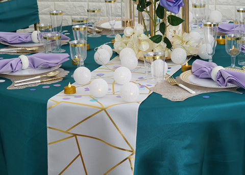 Teal and lavender tablescape with floral centerpiece