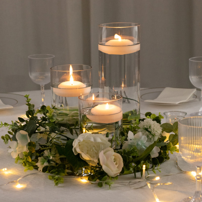 Candlelit floral centerpiece on a table