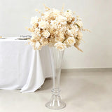 Elegant ivory floral arrangement in tall glass vase for wedding decor