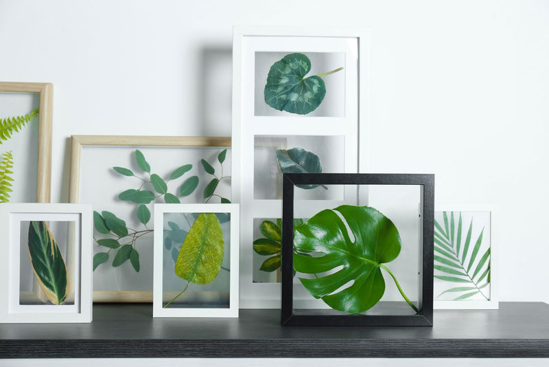 Greenery boxes on a fireplace mantel