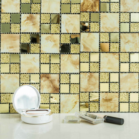 Gold and cream mosaic backsplash with cosmetics