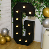 Large decorative letter "G" with lights, perfect for events or home decor.