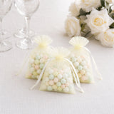 Pastel candy favor bags with tulle ribbon for wedding or party gifts