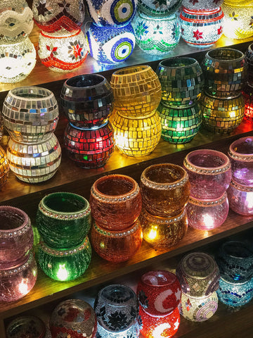 Acrylic crystals and faux pearls in clear containers