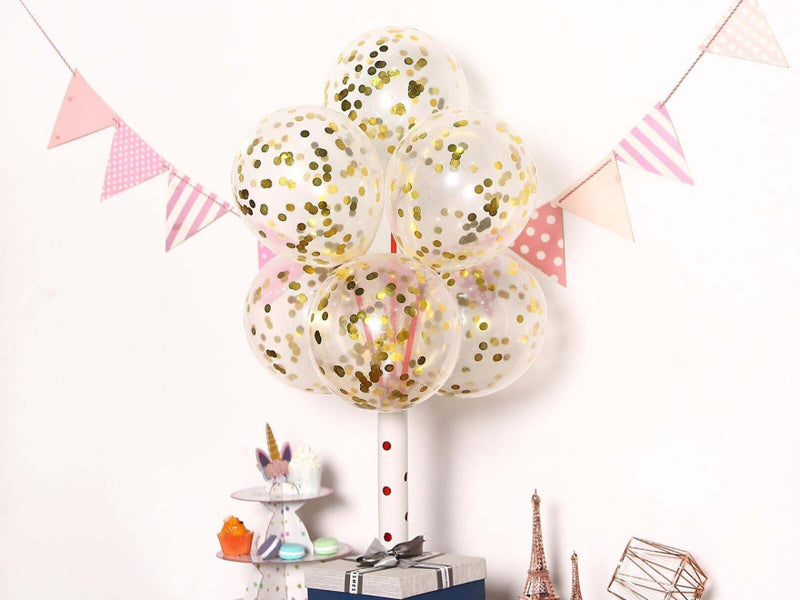 Gold confetti balloon bouquet with pink bunting
