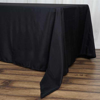 Elevate Your Event Decor with the Black Seamless Polyester Rectangle Tablecloth