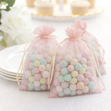 Pastel candy-filled favor bags for celebrations and events.