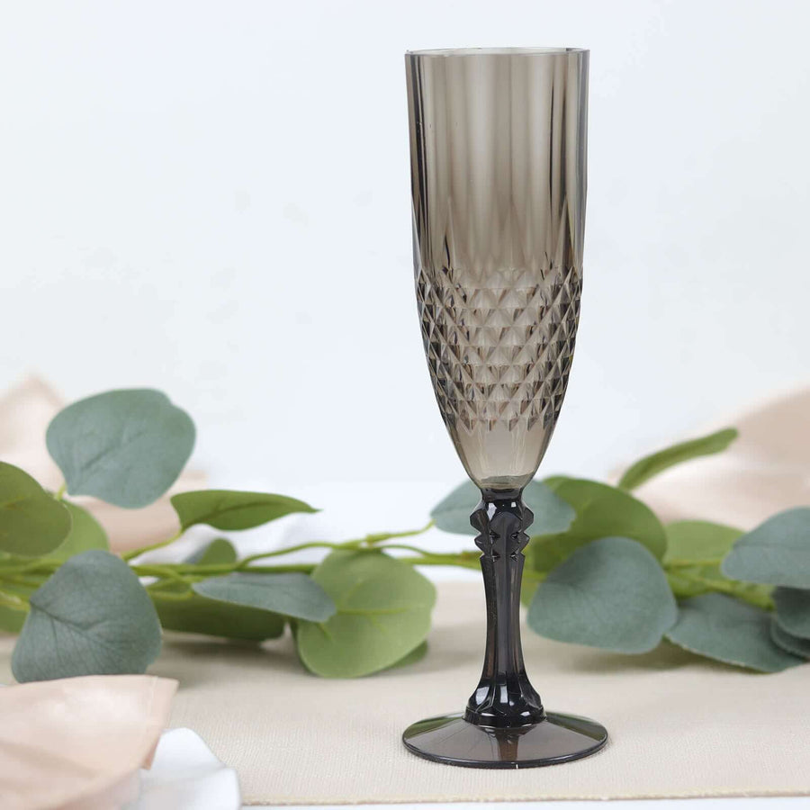 Smoky crystal champagne flute with diamond pattern and black stem