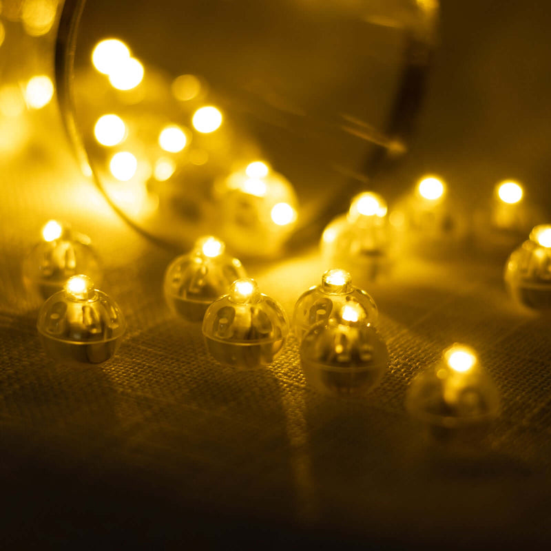 Glowing fairy lights in glass domes