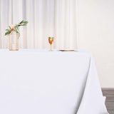 90"x132" White Polyester Rectangular Tablecloth