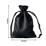 Black satin drawstring bag, 7 inches tall and 5 inches wide.
