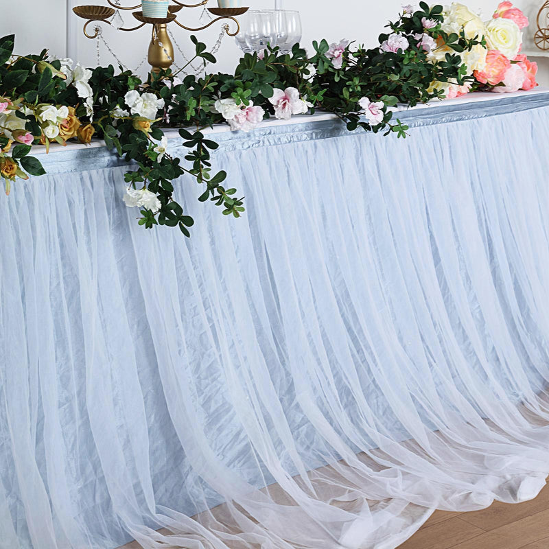 Light blue rose garland on lavender and white background