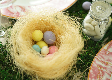 Decorative nest with pastel Easter eggs