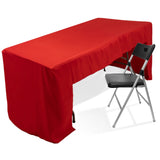 Red table cover draped over a folding table with a black chair