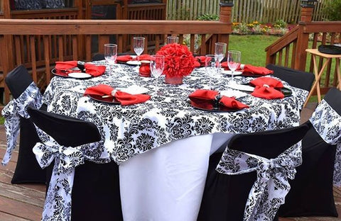 Gray lace tablecloth with floral centerpiece