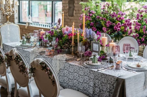 Pink rosette table drape with sequin backdrop