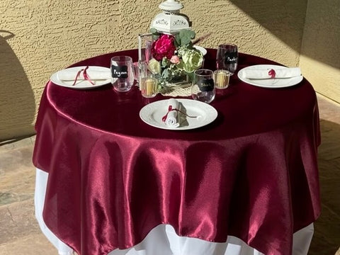 Cream rosette tablecloth with red accents