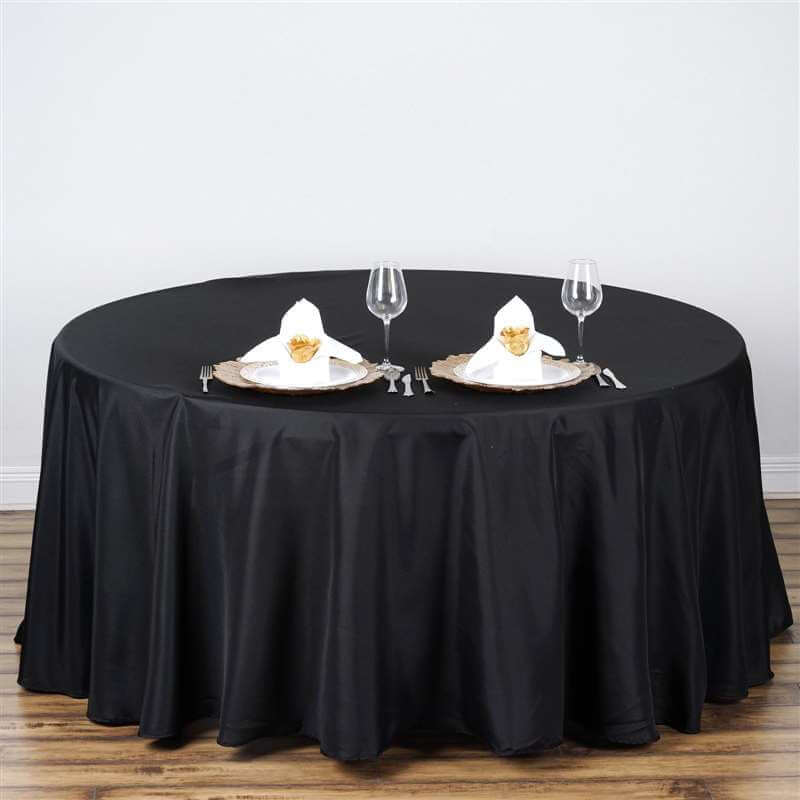 Black round tablecloth on a banquet table