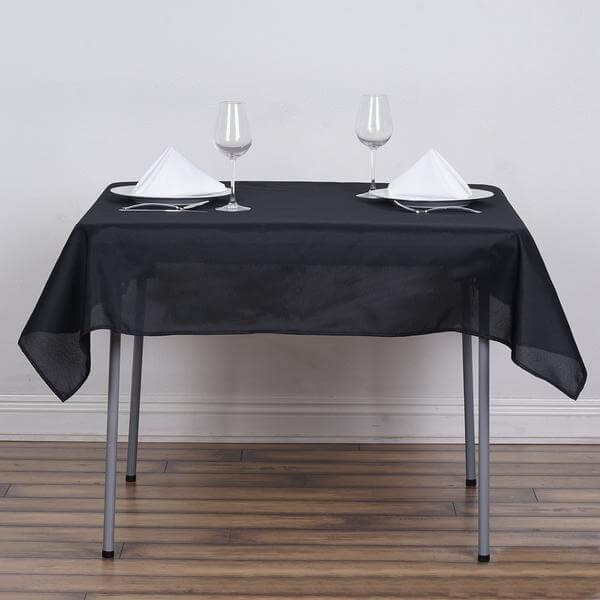 Black table cover on a small dining table